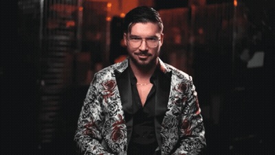 Man In Suit Saying I Can't Say I'm Surprised GIF
