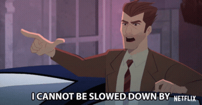 Man In Suit Saying I Cannot Be Slowed Down By Netflix While Pointing GIF
