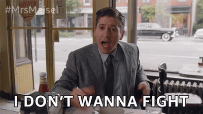 Man In Suit Saying I Don't Wanna Fight GIF