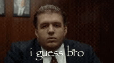 Man In Suit Saying I Guess Bro Pointing GIF