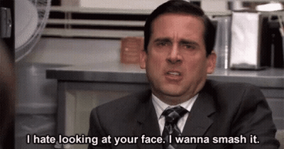 Man In Suit Saying I Hate Looking At Your Face GIF