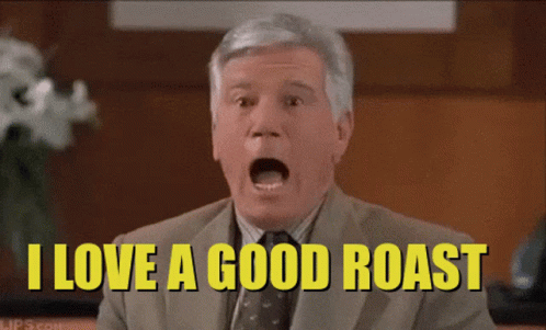 Man In Suit Saying I Love A Good Roast GIF