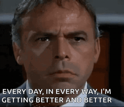 Man In Suit Saying I'm Getting Better GIF