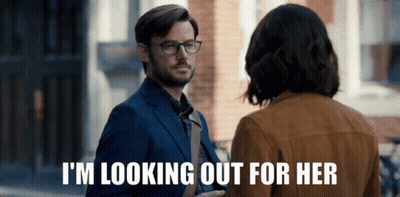 Man In Suit Saying I'm Looking Out For Her GIF