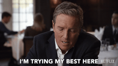 Man In Suit Saying I'm Trying My Best Here GIF