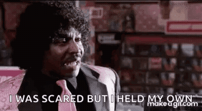 Man In Suit Saying I Was Scared But I Held My Own GIF