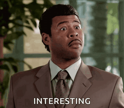Man In Suit Saying Interesting GIF