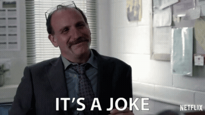Man In Suit Saying It's A Joke GIF