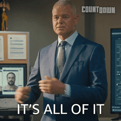Man In Suit Saying It's All Of It At Computer GIF