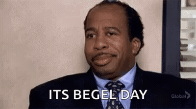 Man In Suit Saying It's Begel Day GIF