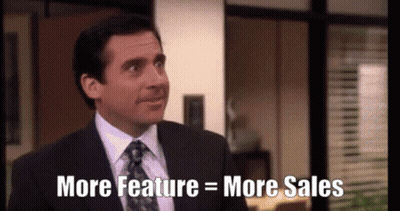 Man In Suit Saying More Feature Equals More Sales GIF
