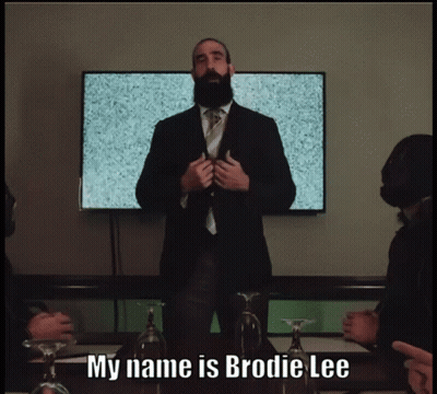 Man In Suit Saying My Name Is Brodie Lee GIF