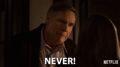 Man In Suit Saying Never In Front Of Woman GIF