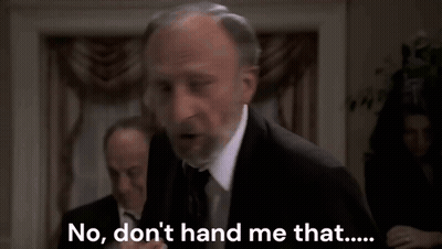Man In Suit Saying No Don't Hand Me That GIF
