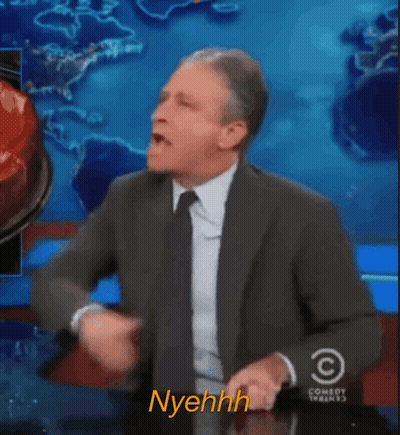 Man In Suit Saying Nyehhh GIF
