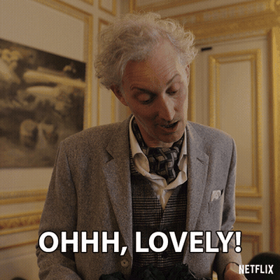 Man In Suit Saying Ohh Lovely GIF