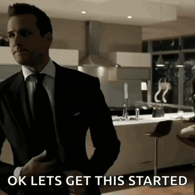 Man In Suit Saying OK Lets Get This Started GIF