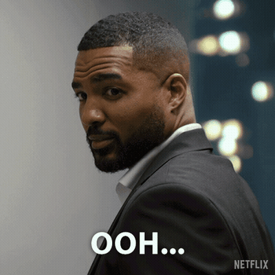 Man In Suit Saying Ooh GIF