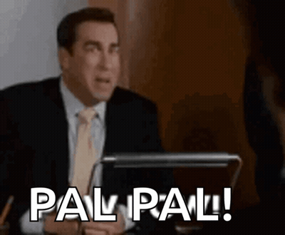 Man In Suit Saying Pal Pal At Desk GIF