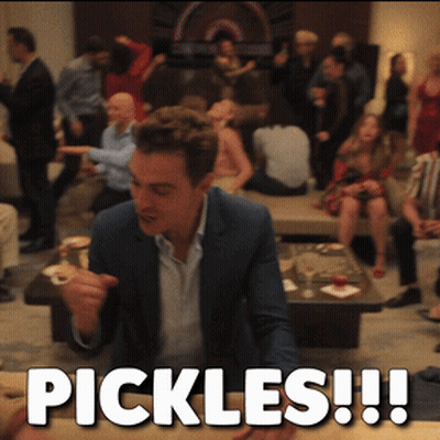 Man In Suit Saying Pickles To Group GIF