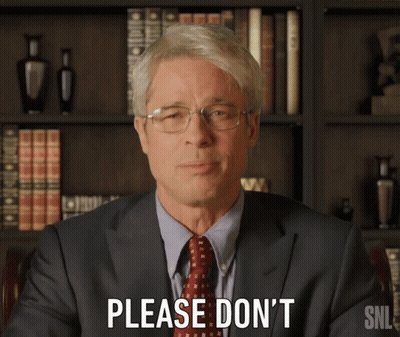 Man In Suit Saying Please Don't In Front Of Bookshelf GIF
