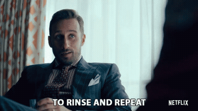 Man In Suit Saying Rinse And Repeat GIF