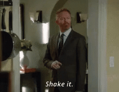 Man In Suit Saying Shake It GIF