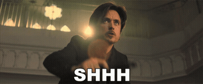 Man In Suit Saying Shhh GIF