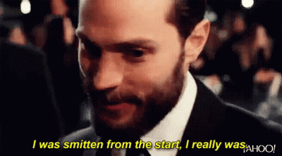 Man In Suit Saying Smitten From Start GIF