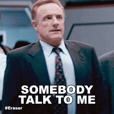 Man In Suit Saying Somebody Talk To Me GIF