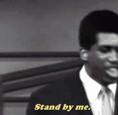 Man In Suit Saying Stand By Me In Yellow GIF
