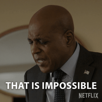 Man In Suit Saying That Is Impossible GIF
