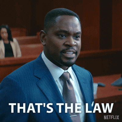 Man In Suit Saying That's The Law GIF