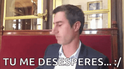 Man In Suit Saying Tu Me Desesperes GIF