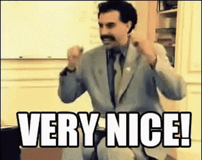 Man In Suit Saying Very Nice GIF