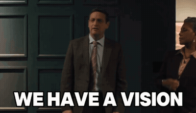 Man In Suit Saying We Have A Vision GIF