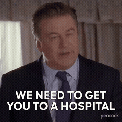 Man In Suit Saying We Need To Get You To A Hospital GIF