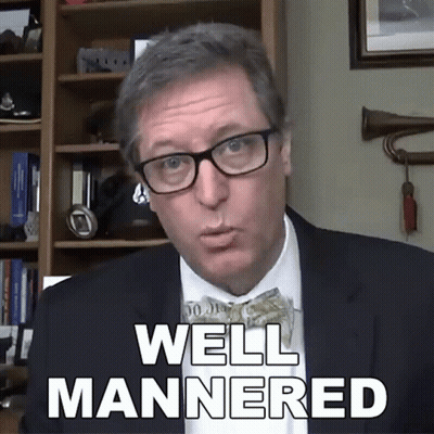 Man In Suit Saying Well Mannered GIF