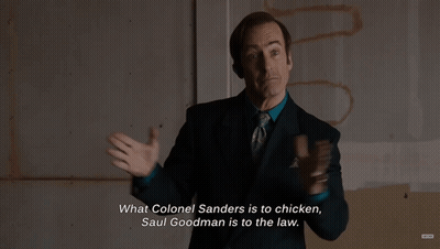 Man In Suit Saying What Colonel Sanders Is To Chicken GIF