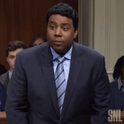 Man In Suit Saying What To Crowd GIF