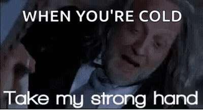 Man In Suit Saying When You're Cold Take My Strong Hand GIF
