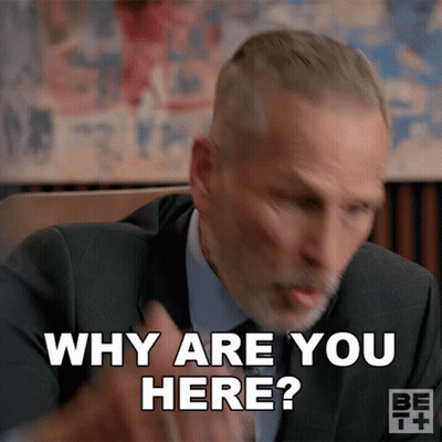 Man In Suit Saying Why Are You Here GIF