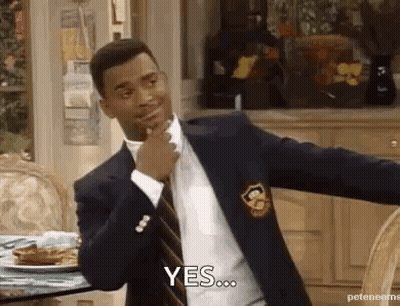 Man In Suit Saying Yes At Table GIF