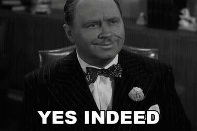 Man In Suit Saying Yes Indeed GIF