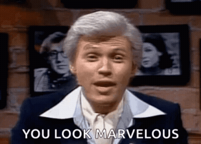 Man In Suit Saying You Look Marvelous GIF