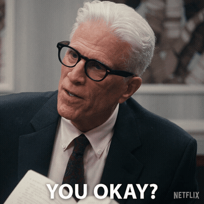 Man In Suit Saying You Okay Holding Paper GIF