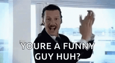 Man In Suit Saying You're A Funny Guy Huh GIF