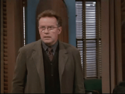 Man In Suit Says Calm Yourself Little One GIF