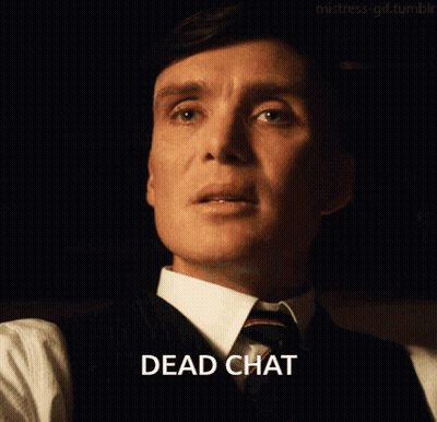 Man In Suit Says Dead Chat In Dark Room GIF