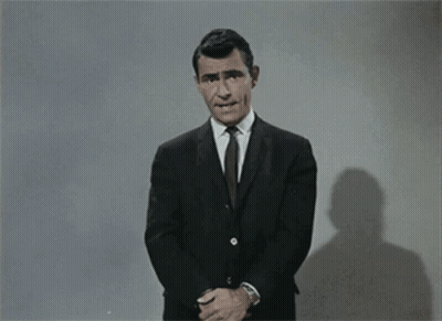 Man In Suit Says Fortune Favors The Bold Stay Tuned A Strange Experience Ami GIF